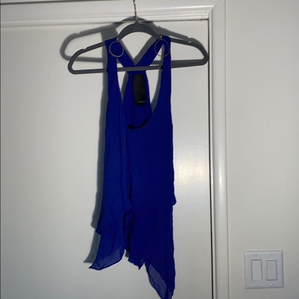 Subtly cobalt blue shirt & gold earrings